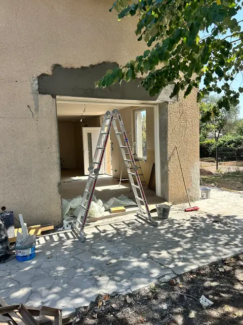 Démolition et ouverture d'un mur pour une baie vitrée